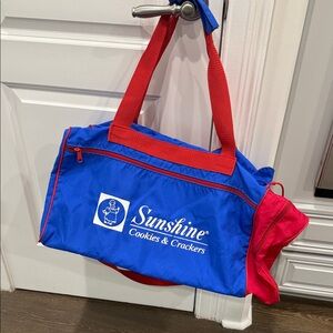 Vintage Sunshine Cookies & Crackers advertised Blue and Red Travel/Duffle Bag
